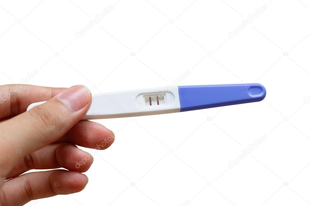 Woman is holding positive pregnancy test in her hand. Close-up. Isolated on white background.With clipping path.