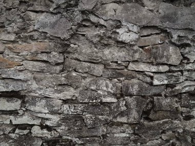Çok eski taş duvar desenli fotoğrafın arkaplanı.
