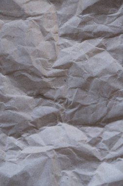 Kahverengi buruşmuş geri dönüşümlü kağıt doku arka planı. Kahverengi buruşmuş geri dönüşümlü karton yaprağın Kraft Kağıt dokusu arka planı