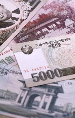 Kuzey Kore para kazanmıştı. KPW 'nin Kuzey Kore banknotları yakın plan. Kuzey Kore 'de iş, ekonomi ve yatırım kavramı.