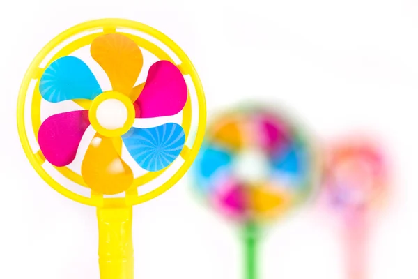 Tres Ventiladores Multicolores Diferentes Niveles Enfoque Sobre Fondo Blanco —  Fotos de Stock