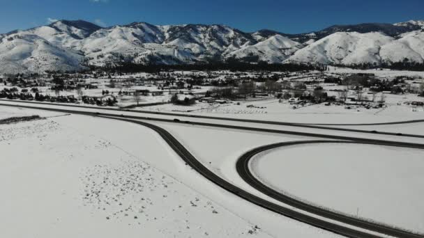 Drone Descent Snow Blanketed Freeway Lanes Traffic Separated Median — Stock video