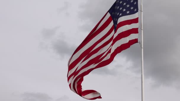 Large American Flag Waving Wildly Strong Wind Slow Motion — Stockvideo