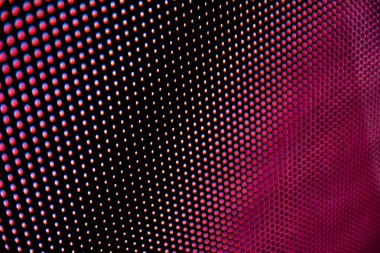 Pembe, mavi ve mor tonlu noktalı arkaplan. Soyut tasarım için. Görüntü LED ekranından alındı.