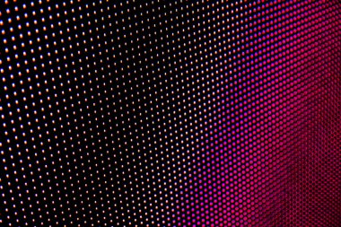 Pembe, mavi ve mor tonlu noktalı arkaplan. Soyut tasarım için. Görüntü LED ekranından alındı.