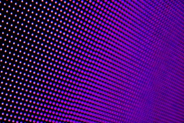 Pembe, mavi ve mor tonlu noktalı arkaplan. Soyut tasarım için. Görüntü LED ekranından alındı.