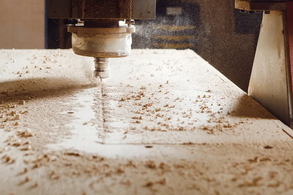 Close-up shot of cutting wood with a cnc milling machines. — Stock Photo, Image