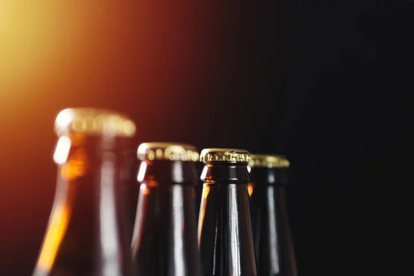 Group Glass Beer Bottles Dark Background Copyspace — Stock Photo, Image