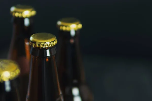 Group Glass Beer Bottles Dark Background Copyspace — Stock Photo, Image