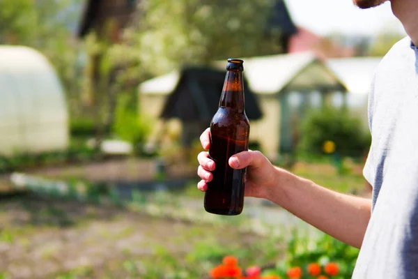 Young Man Bottle Beer His Hand Garden — Stock Photo, Image