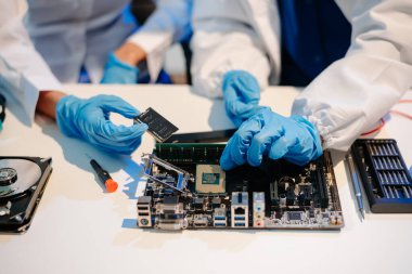 Electronics assembly and RAM installation with high-tech components. Ideal for showcasing advanced technology and computer engineering concept