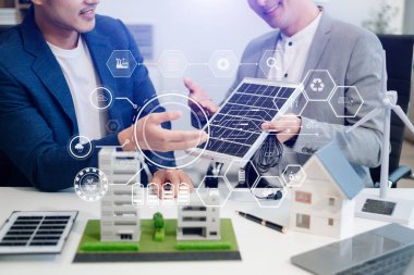 Business team working virtual modern smartphone to reduce CO2 emissions carbon footprint climate change to limit global warming.Sustainable development and green business concept. at offic