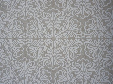 Tarafsız bej kumaş dokusunda, kusursuz bir şekilde tekrarlanan beyaz çiçek tomarı deseni içeren zarif bir İtalyan maske duvar kağıdı arkaplanı. Ev dekoru.