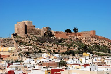 Moorish castle above city buildings, Almeria. clipart