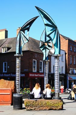 Darwin Gate Sculpture in the town centre, Shrewsbury. clipart