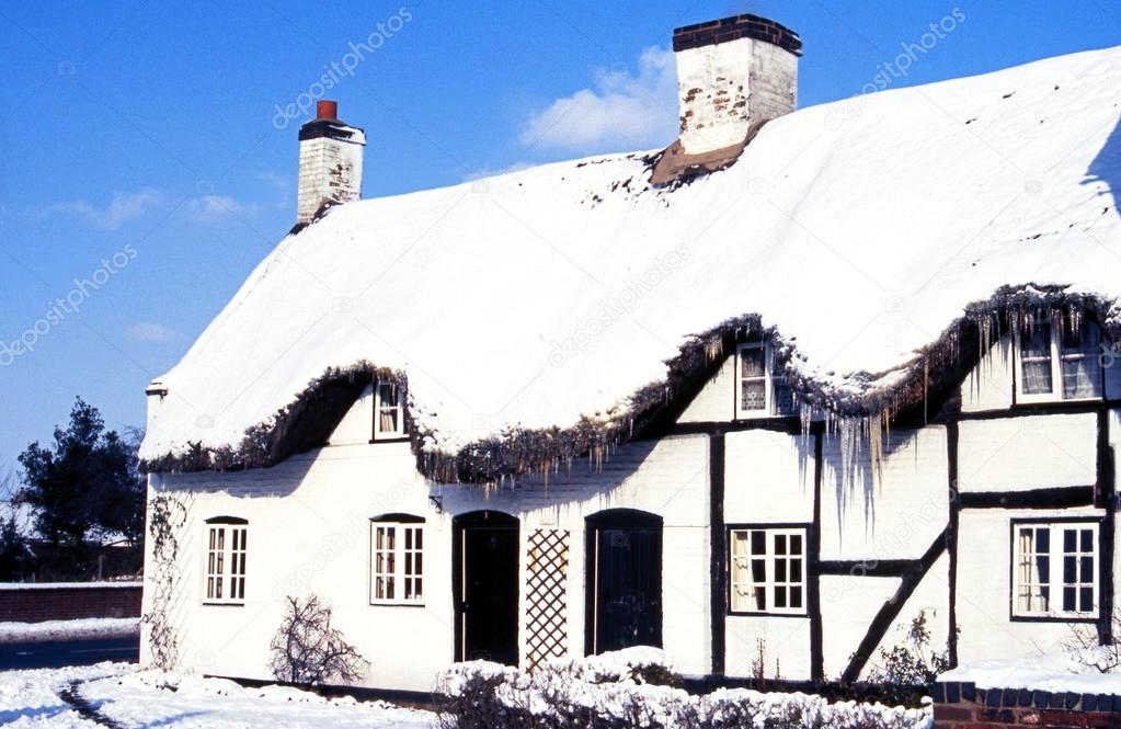Thatched cottage covered with snow, Kings Bromley.