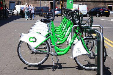 City hire bikes near Lime Street Station, Liverpool. clipart