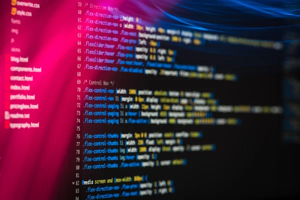 HTML y código CSS desarrollando captura de pantalla con efectos de luz . — Foto de Stock