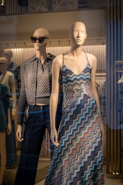 Milan, Italy - 2026, 3 Feb: Missoni FW25 window display featuring signature zigzag patterns and luxury knitwear in a chic, modern boutique setting