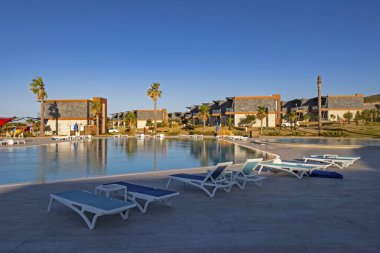 Alacati, İzmir, 15 Ağustos 20.Resort Zigana Alacati, Ege Denizi 'nin büyüleyici dokusu ve maviliğin eşsiz güzelliği ile çevrili bir körfezde yer almaktadır. Tesisin genel görünümü .