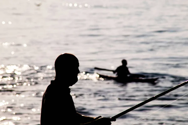 Silhouettes Amateur Fishermen Fishing Rods Seashore Early Morning Time — Stock Photo, Image