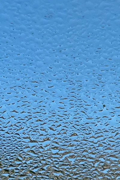 Regentropfen Und Tröpfchen Auf Dem Glas Schließen — Stockvektor