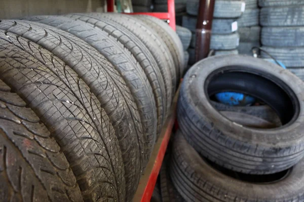 old car tires from tire repair shop, car tire tires for recycling,