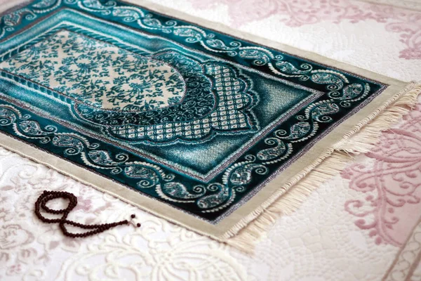 Praying on the prayer rug, which is the prayer rug of Muslims, on the prayer rug.