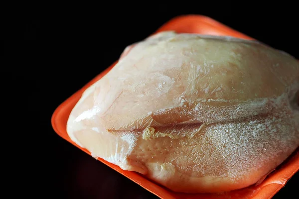 freshly dumped frozen chicken tenderloin, frozen chicken breast,