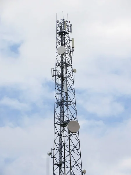 cloudy sky and telephone base station, telephone base station transmitters,