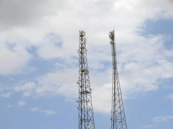 cloudy sky and telephone base station, telephone base station transmitters,