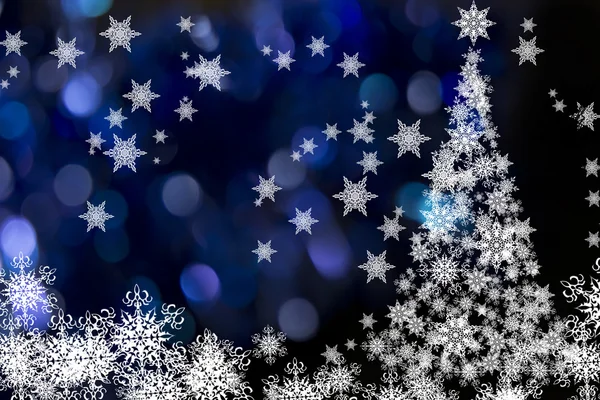 Julgran på blå bokeh bakgrunden — Stockfoto