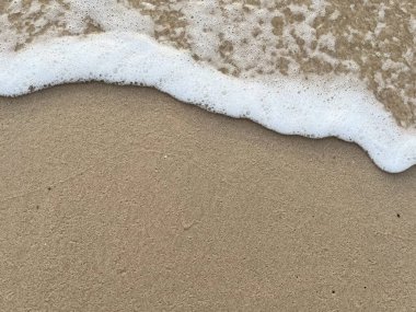 Beyaz köpüklü plaj arka planı 