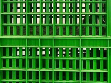 Parlak Yeşil Plastik Sandıkların Soyut Şablonu Birleştirildi