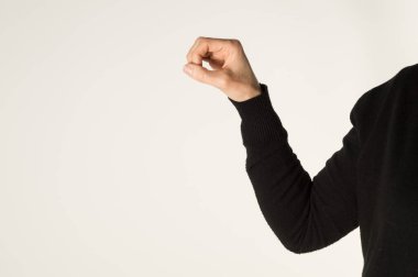 Amerikan İşaret Dili 'nde' O 'harfini temsil eden bir daire oluşturan el (ASL).