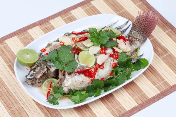 Tilapia fish streamed lemon is food for good life on Chinese festival.