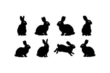 Yedi siyah tavşan silueti beyaz bir arka planda farklı bakış açıları sergiliyor.