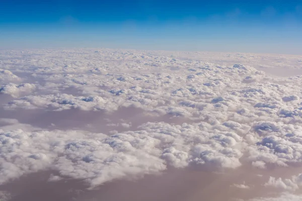 Scenery of cloud in the sky, view from a plane window.