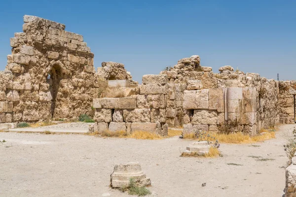 Ruins of the walls in the Amman Citadel, a historical site at the center of downtown Amman, Jordan. Known in Arabic as Jabal al-Qal\'a, one of the seven jabals(mountains) that originally made up Amman