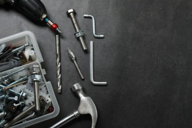 Repair tools, plumber, locksmith, electrician on concrete floor