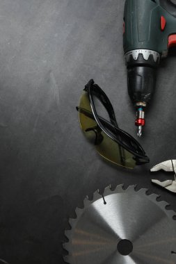 Repair tools, plumber, locksmith, electrician on concrete floor