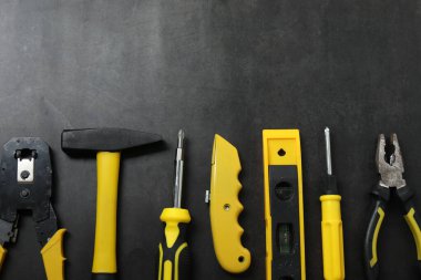 Repair tools, plumber, locksmith, electrician on concrete floor