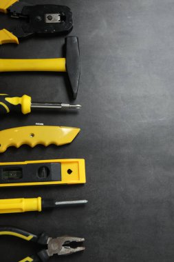 Repair tools, plumber, locksmith, electrician on concrete floor