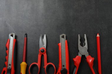 Repair tools, plumber, locksmith, electrician on concrete floor