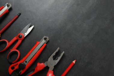 Repair tools, plumber, locksmith, electrician on concrete floor