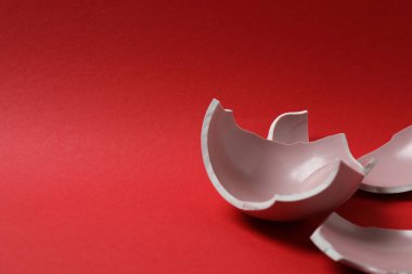 Broken dishes on the floor.