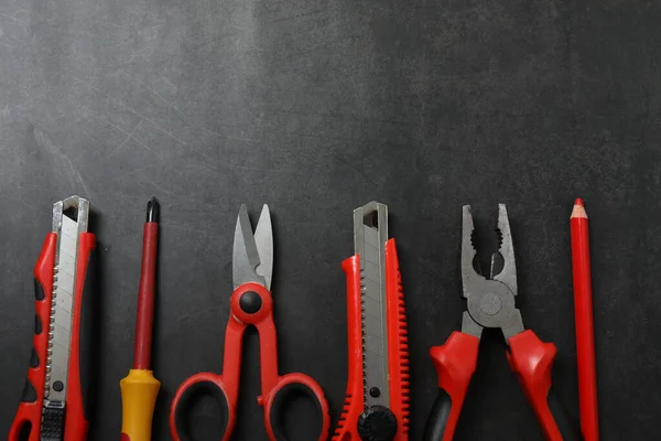 Repair tools, plumber, locksmith, electrician on concrete floor