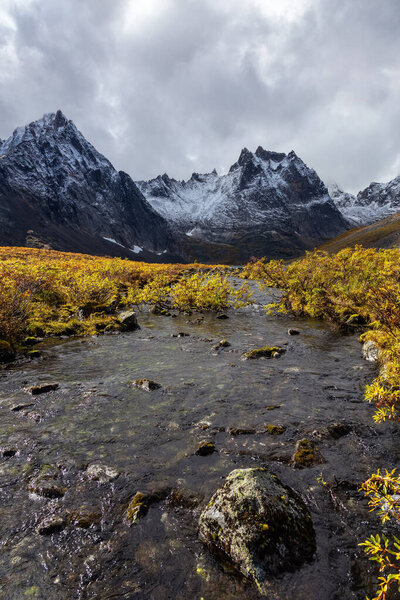 Scenic Alpine River and Mountains on Fall Day