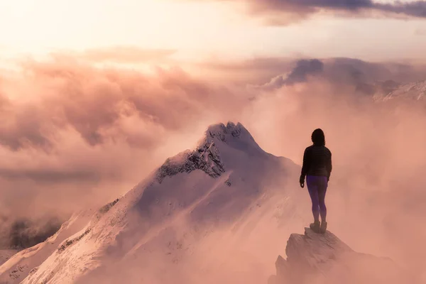 Fantasy Adventure Composite with a Girl on top of a Mountain Cliff — Stock Photo, Image