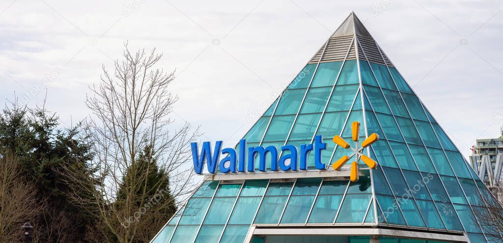 Surrey, British Columbia, Canada - December 23, 2020: Walmart Sign at the Guildford Town Centre Shopping Mall.